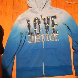 A blue 'love justice " jacket